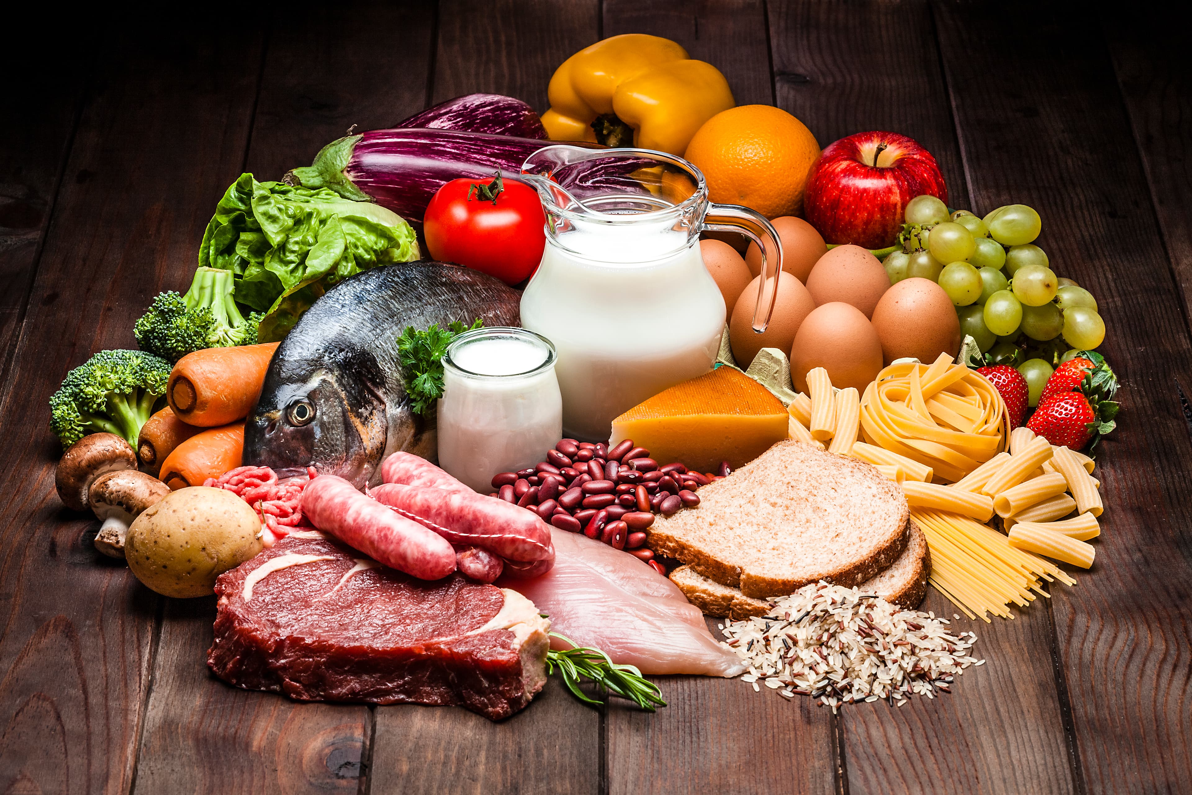 Various foods on wooden table