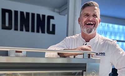 Front cooking professional Fredy Bauer, Trainer Academy