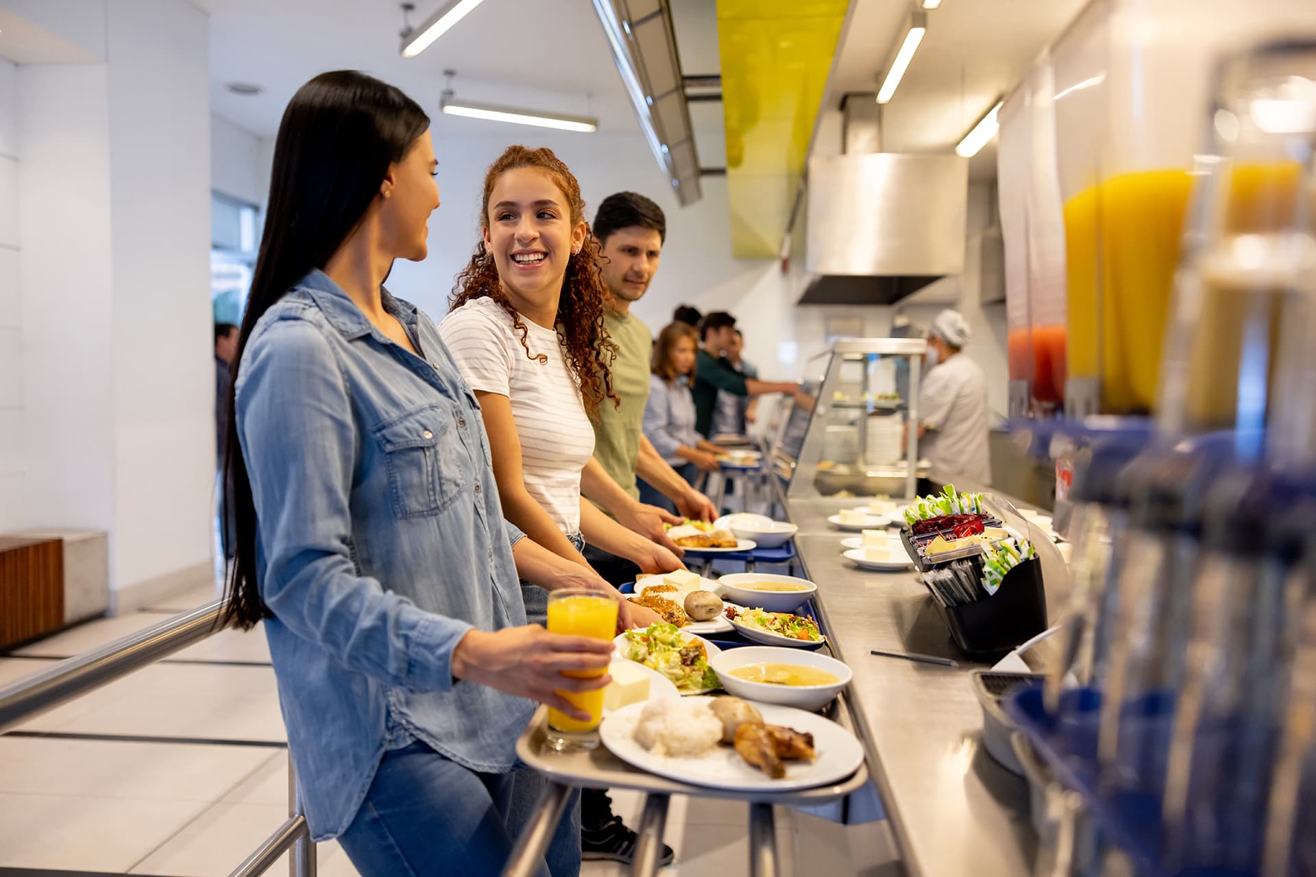 People eating at a buffet-style cafeteria